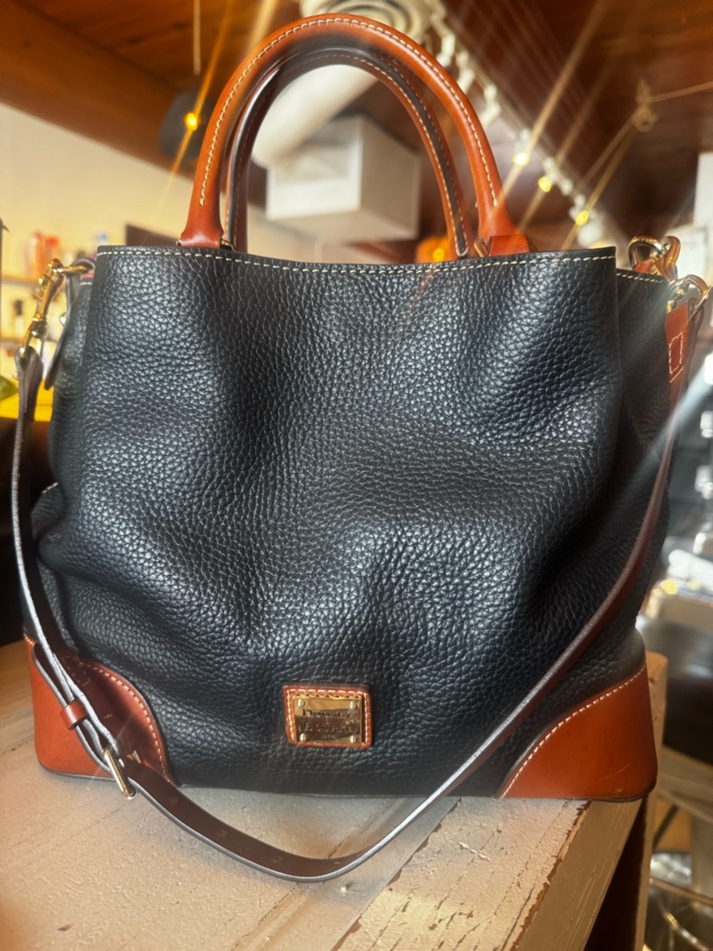 Dooney & Bourke Black Leather Tote with Brown Trim and Handles - Picture 2 of 10